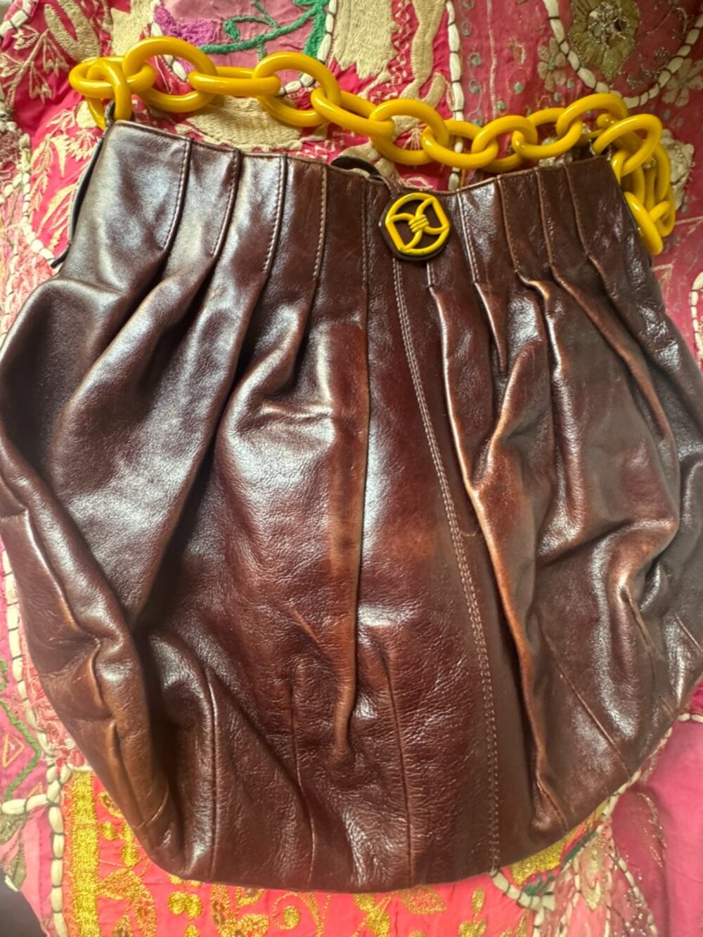 Wine-colored Donna Karan leather bag with bakelite strap